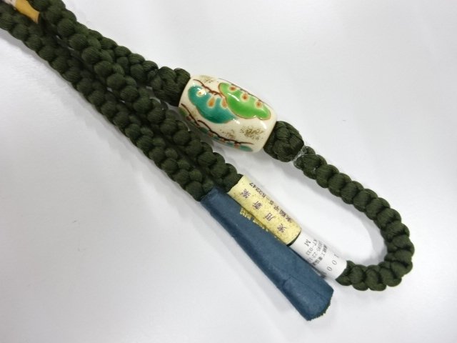  未使用品　金彩色絵磁器帯留め・正絹手組帯締めセット